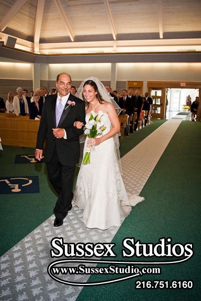 Jennifer & Dad walking down aisle on her wedding